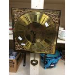 An 18th Century brass 30hr long case clock face, in wooden wall mount by Benjamin Rodgers of