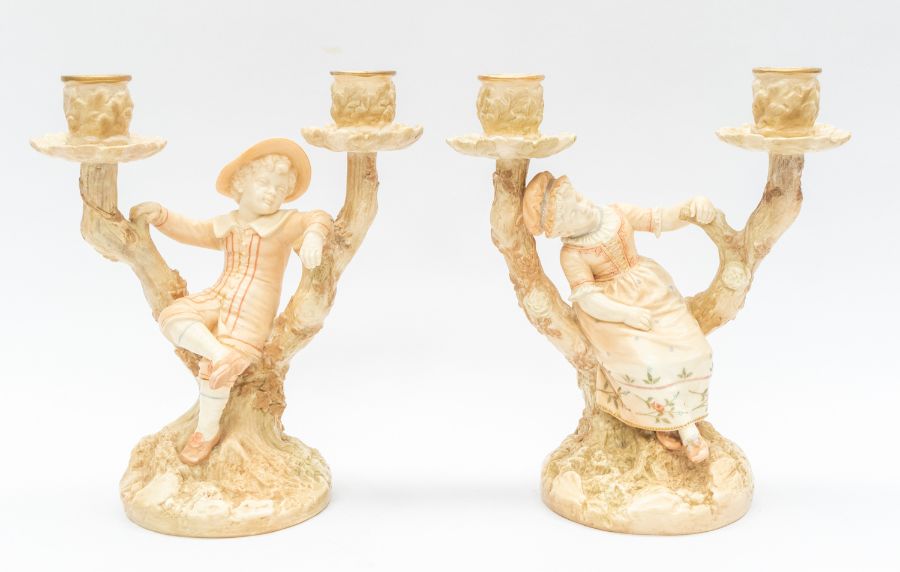 A pair of Hadley Royal Worcester candlesticks.  Restored condition. 9" high