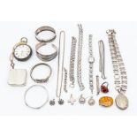 A collection of silver and white metal jewellery to include Victorian silver chains, earrings,