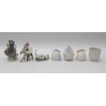 Three Lladro figures of young ladies and geese along with two Lladro table bells, candle pot and