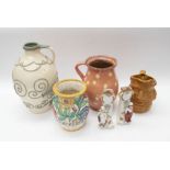 A collection of late 19th Century stone ware pots, bottles, jelly moulds, vases, teapots, Toby