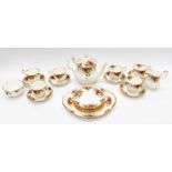 A Royal Albert Old Country Roses pattern tea service including four cups and saucers, teapot, side