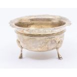 A late Victorian small silver sugar bowl, on three hoof feet hallmarked by William Aitken,