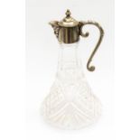Early 20th Century to mid 20th Century claret jug with plated top and Bacchus spout with cut glass