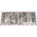 Eight white metal Japanese panels