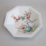 A late 20th century Japanese polychrome octagonal dish decorated painted with the 3 friends of