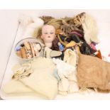 Dolls: A collection of assorted doll parts to include: limbs, hair, and others. Please assess