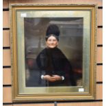 An oil over photo of a late 19th Century lady in mourning wear, in frame and 30 x 36cms approx