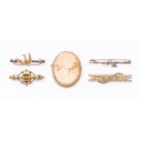 A collection of Victorian and later 9ct gold sweetheart brooches including a Victorian brooch in