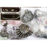 A collection of costume jewellery to include vintage and later bead necklaces, bangles, brooches,