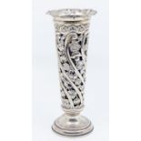 An Edwardian silver flared pierced trumpet shaped vase, scrolling floral and scroll decoration,