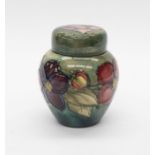 A Moorcroft Clematis pattern ginger jar and cover, shape no: 769, the cover and base with HM Queen