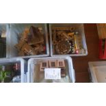 2 boxes containing a castle model, with a box of plastic buildings, a box of card buildings and a