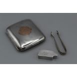 A selection of three late Victorian/ early 20th century silver, comprising a cigarette case,