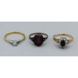 A trio of dress rings. A sapphire and illusion set diamond 9ct gold ring, size N, weight 1.7gm. A