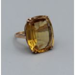 An attractive Citrine set cocktail ring set in yellow metal which tests as 9ct gold, size R, gross