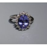 A very fine Tanzanite cocktail ring, set in white metal (tests as 14ct white gold), stone 5.18cts