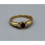 A ruby and diamond 18ct yellow gold ring, size Q gross approx weight 4.7gm