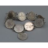 Silver bracelet with Russian Kopeks, quantity nine, dates 1911-1916