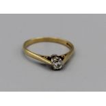 Est 1/4 carat diamond solitaire in vintage raised claw setting. Approx gross weight 2.5gm, size P