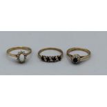 A trio of dress rings in 9ct gold comprising an opal and diamond cluster, approx weight 2gm, size Q,