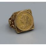 A 9ct gold ring set with a half sovereign (1897), gross weight 13.6gm, size S 1/2