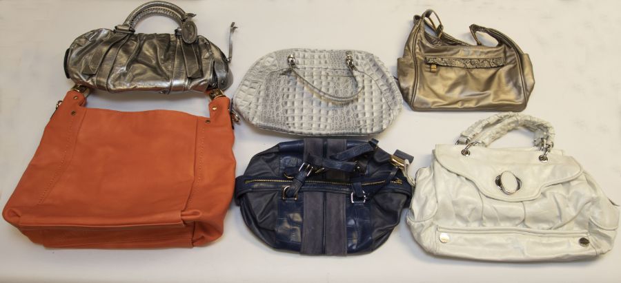 A collection of 13 handbags: one pearl white leather Coccinelle bag; one Abbacino black-and-white - Image 2 of 2