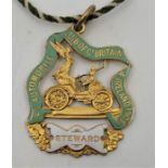 "Automobile Club of Gt. Britain & Ireland 1903", a part enamel and gilt metal Steward's motoring