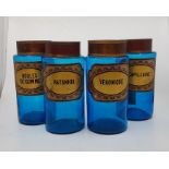 4 French, hand blown, blue glass, apothecary jars, original applied labels with tin lids.  No