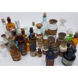 A large quantity of small pharmaceutical bottles, of various sizes. Labels include: poison, acid