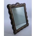 A silver mounted easel back table miror, with bevelled plate, height 28cm