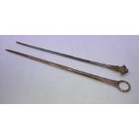 A George III silver meat skewer, London 1791, makers mark "W.S", length 33cm, (88.6g), together with