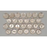 A collection of silver miniature plates, "The Floral Alphabet", by Franklin Mint, London 1979,