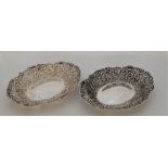 A pair of Victorian oval silver baskets, by William Comyns & Sons, London 1895, repousse and pierced