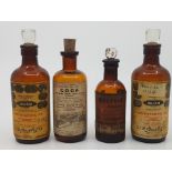 4 small antique brown glass chemist bottles with original labels. Labels include Elixir No. 47,