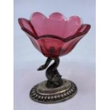 A 19th century Austro-Hungarian cranberry glass dish mounted on silver stand, the swan form stand