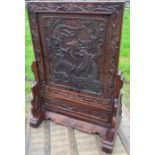 An early 20th cent heavy Chinese hardwood table screen, H:63cm, W: 46cm (widest)