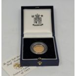 An Elizabeth II 1998 gold proof half sovereign coin, in capsule and Royal Mint case with numbered