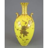 An early twentieth century Royal Crown Derby porcelain two-handled vase, c. 1900.  It is decorated