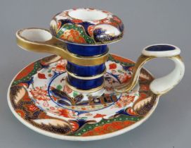 An early nineteenth century Spode porcelain hand-painted pattern 957 chamberstick, c. 1820. It is