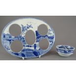 An early nineteenth century blue and white transfer-printed Spode Caramanian series egg cup holder