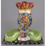 An early nineteenth century pearlware Walton Royal Arms figural group, c. 1820. Marked to the