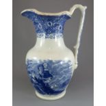 An early nineteenth century blue and white transfer-printed ewer jug decorated with a titled