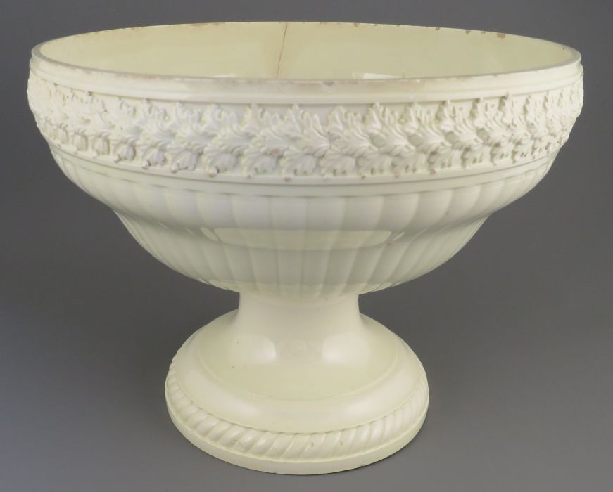 An eighteenth century creamware footed, circular open dish with moulded details, possibly