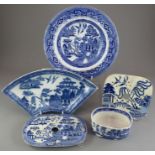 A group of early to mid-nineteenth century blue and white transfer-printed Willow pattern wares,