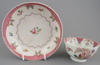 A late eighteenth century hand-painted Newhall tea bowl and similar saucer, c. 1770-80. The saucer