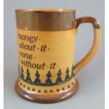 A late nineteenth century Doulton Lambeth stoneware large motto mug, c. 1895. It is decorated