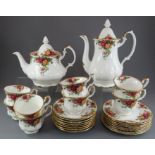 An extensive Royal Albert Country Roses tea service, comprising of: eight cups and saucers, eight