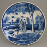 An eighteenth century English tin glazed earthenware hand-painted blue and white delft plate, c.