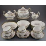 An early nineteenth century Spode porcelain bat printed tea service decorated with landscapes and